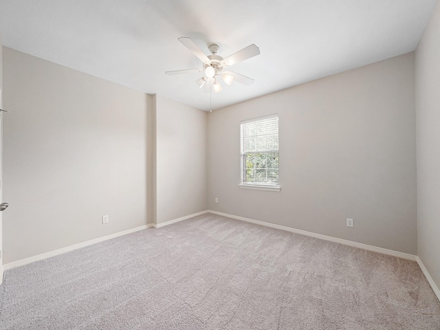4015 Candle Cove Ct, Sugar Land, TX 77479 - unfurnished room with ceiling fan, light colored carpet, and baseboards