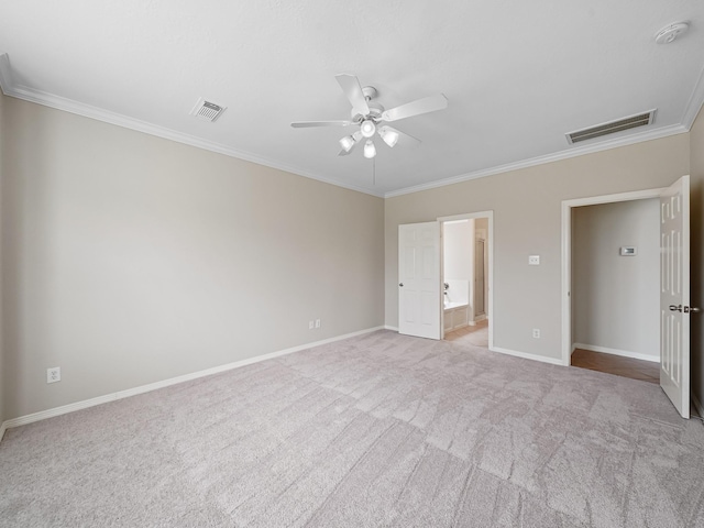 4015 Candle Cove Ct, Sugar Land, TX 77479 - unfurnished bedroom featuring ornamental molding, carpet flooring, baseboards, and ceiling fan