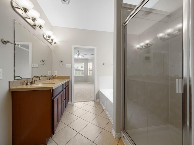 4015 Candle Cove Ct, Sugar Land, TX 77479 - bathroom with a garden tub, double vanity, tile patterned floors, a shower stall, and a ceiling fan