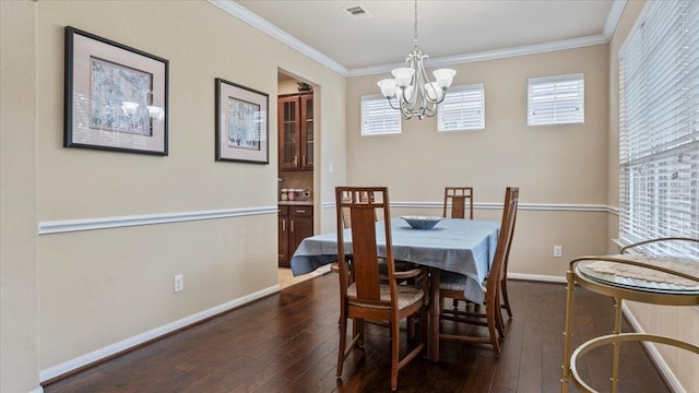 13822 Birney Point Ln, Houston, TX 77044 - dining area with a chandelier, ornamental molding, dark wood-style flooring, baseboards, and plenty of natural light