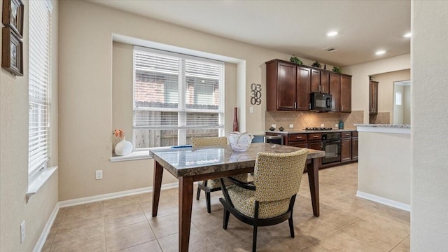 13822 Birney Point Ln, Houston, TX 77044 - dining space with recessed lighting, baseboards, and light tile patterned floors