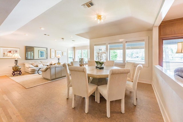 1927 E Lake Dr, Huntsville, TX 77340 - dining area with baseboards and light wood-style floors