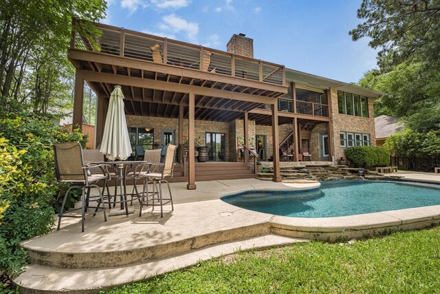 1927 E Lake Dr, Huntsville, TX 77340 - view of pool with a patio, stairs, and a deck