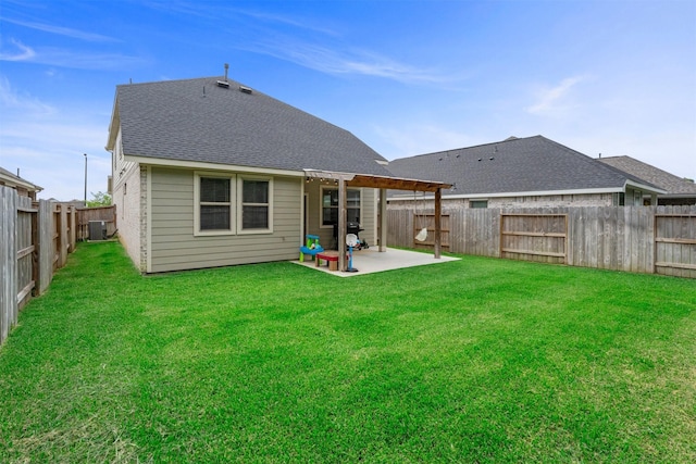 19180 Cedar Lennox Cir, Magnolia, TX 77355 - back of property with central AC, a patio area, and roof with shingles