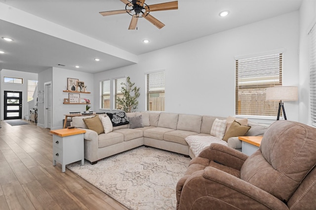 19180 Cedar Lennox Cir, Magnolia, TX 77355 - living area with a ceiling fan, wood finished floors, recessed lighting, healthy amount of natural light, and baseboards