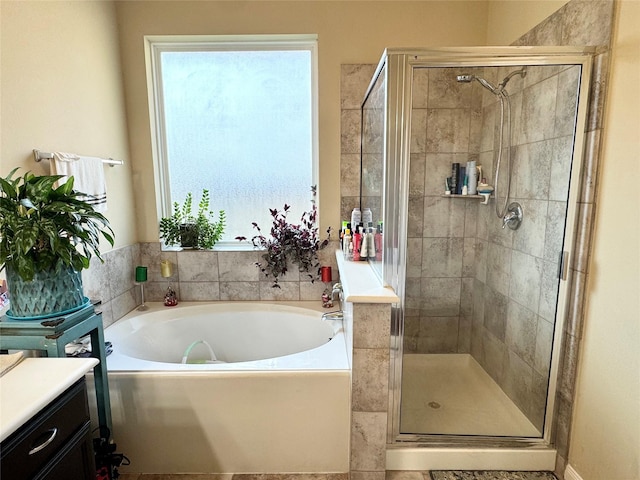 1315 Maple Ace Dr, Katy, TX 77493 - full bath featuring a bath, a shower stall, vanity, and healthy amount of natural light