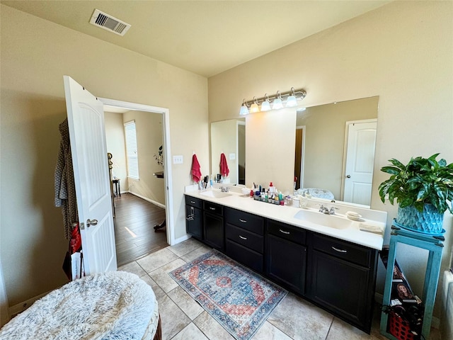 1315 Maple Ace Dr, Katy, TX 77493 - full bath featuring double vanity and tile patterned flooring