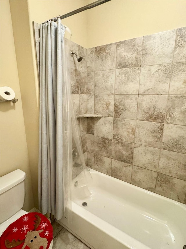 1315 Maple Ace Dr, Katy, TX 77493 - bathroom featuring shower / bath combination with curtain and toilet