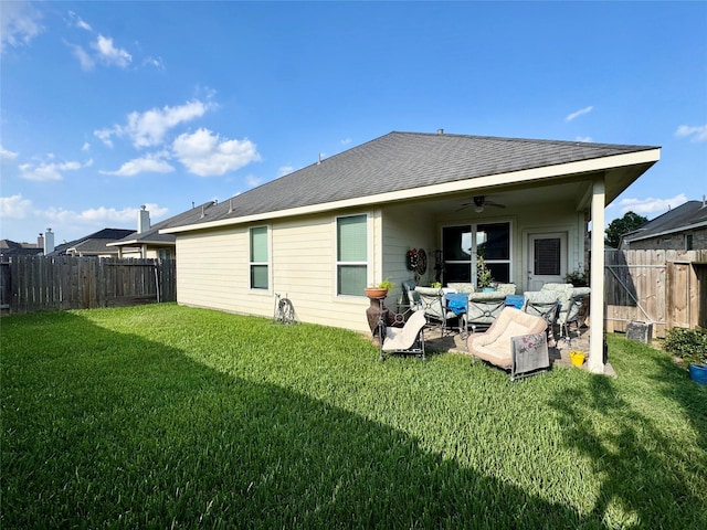 1315 Maple Ace Dr, Katy, TX 77493 - back of property featuring a ceiling fan, a patio, and a shingled roof