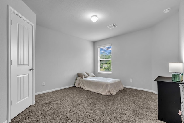 25424 Grotto Falls Ln, Porter, TX 77365 - carpeted bedroom with baseboards