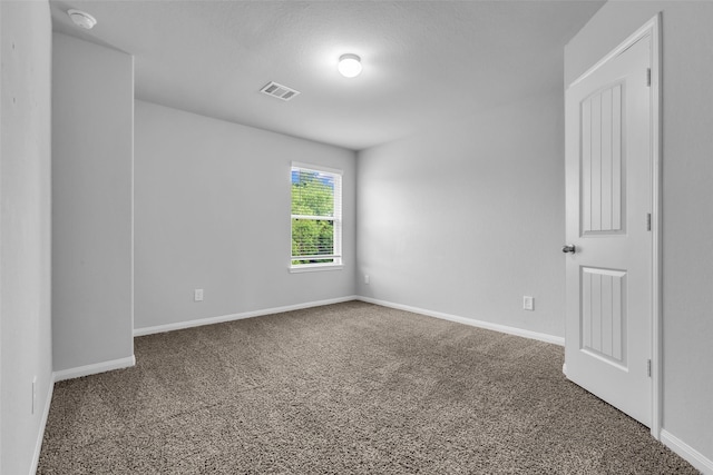 25424 Grotto Falls Ln, Porter, TX 77365 - spare room with carpet, a smoke detector, and baseboards