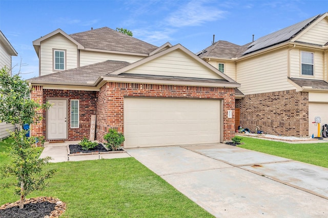 25424 Grotto Falls Ln, Porter, TX 77365 - traditional-style home featuring brick siding, concrete driveway, a front yard, and roof with shingles