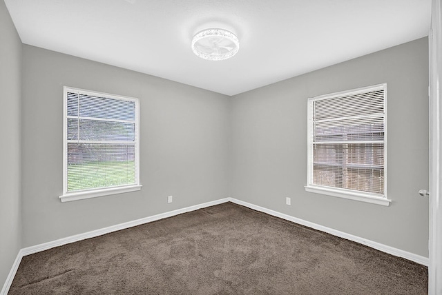 3515 Meadowlake Rd, Pasadena, TX 77503 - unfurnished room featuring dark carpet and baseboards