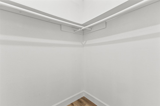 10503 Long River Dr, Sugar Land, TX 77498 - walk in closet featuring wood finished floors
