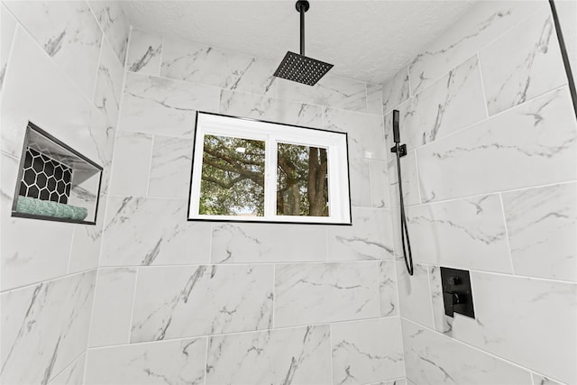 10503 Long River Dr, Sugar Land, TX 77498 - full bath with a tile shower and a textured ceiling