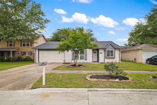 10503 Long River Dr, Sugar Land, TX 77498 - view of front of property featuring an attached garage, concrete driveway, a front yard, and brick siding