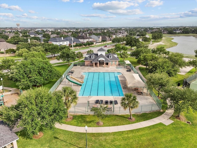 2965 Rustic Pier Ln, League City, TX 77573 - community pool featuring a patio, a water slide, a water view, and a residential view