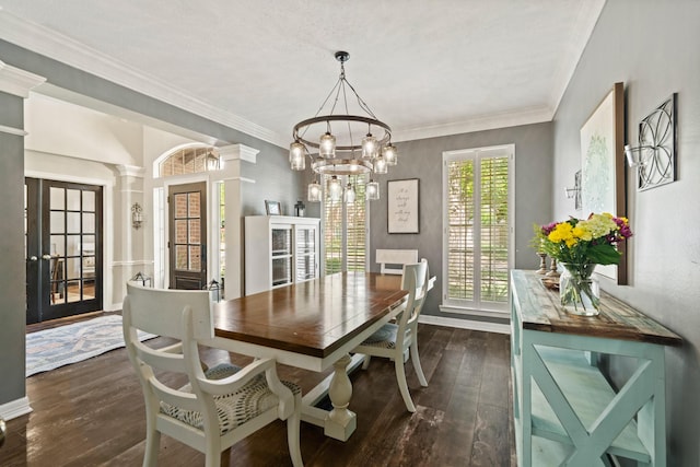 1915 Landon Point Cir, Katy, TX 77450 - dining space with dark wood-type flooring, a chandelier, baseboards, french doors, and ornamental molding