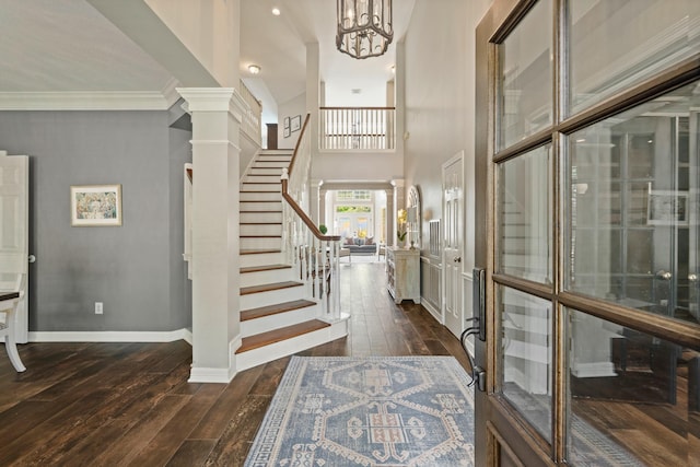 1915 Landon Point Cir, Katy, TX 77450 - foyer entrance featuring stairway, dark wood-style flooring, baseboards, a towering ceiling, and ornate columns