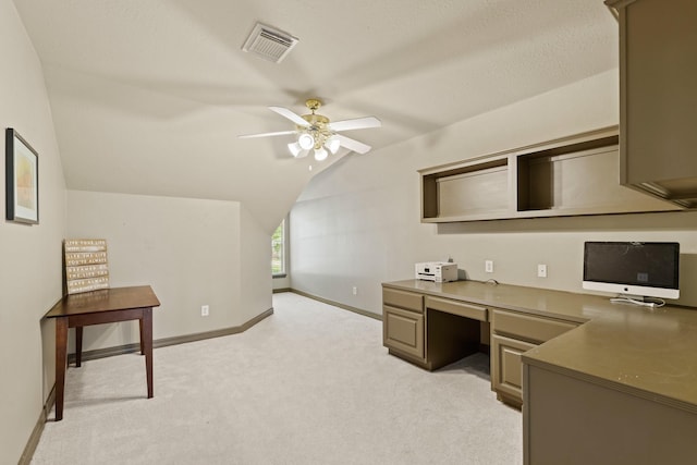 1915 Landon Point Cir, Katy, TX 77450 - office featuring lofted ceiling, light colored carpet, a ceiling fan, built in desk, and baseboards