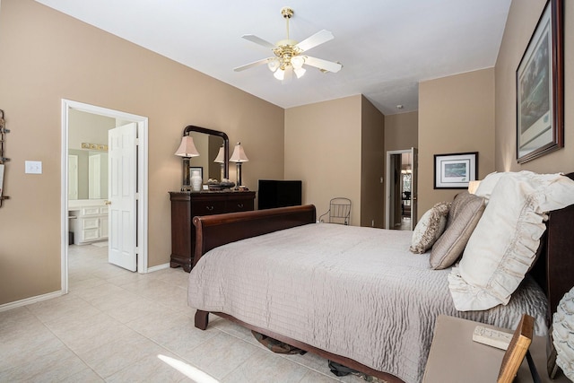 10235 Shipmans Landing Dr, Missouri City, TX 77459 - bedroom with baseboards, light tile patterned floors, ensuite bathroom, and ceiling fan