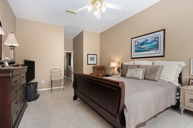 10235 Shipmans Landing Dr, Missouri City, TX 77459 - bedroom with light tile patterned floors, baseboards, and ceiling fan