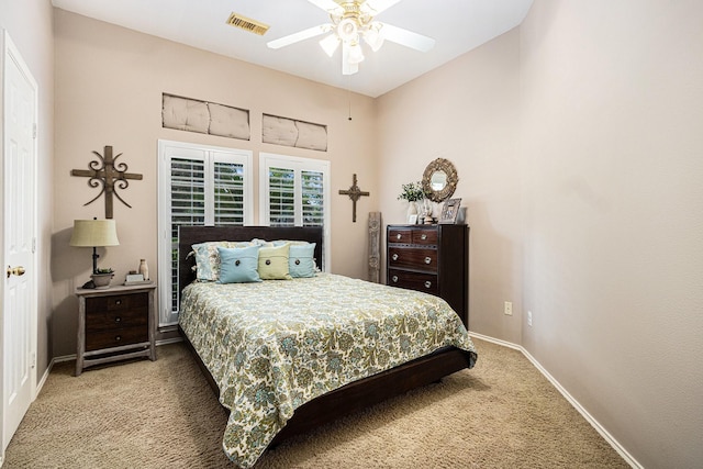 10235 Shipmans Landing Dr, Missouri City, TX 77459 - bedroom with carpet floors, baseboards, and a ceiling fan