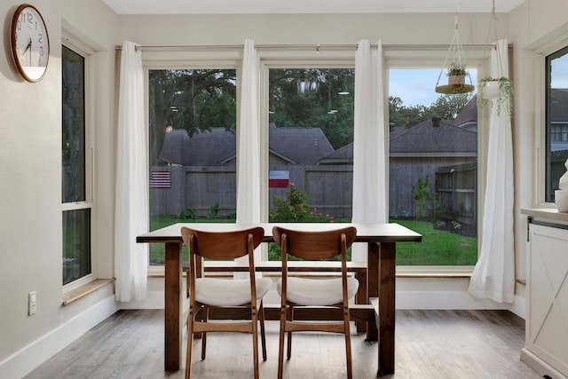907 Eva Dr, Katy, TX 77493 - dining area featuring wood finished floors and baseboards