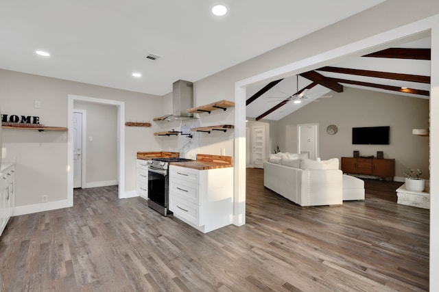 907 Eva Dr, Katy, TX 77493 - kitchen featuring island range hood, open shelves, stainless steel range with gas cooktop, white cabinets, and ceiling fan