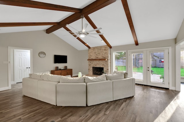 907 Eva Dr, Katy, TX 77493 - living area featuring wood finished floors, a large fireplace, ceiling fan, and french doors