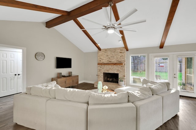 907 Eva Dr, Katy, TX 77493 - living room with wood finished floors, ceiling fan, a fireplace, and french doors