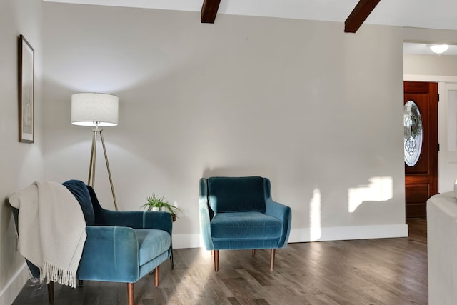 907 Eva Dr, Katy, TX 77493 - living area featuring beamed ceiling, wood finished floors, and baseboards