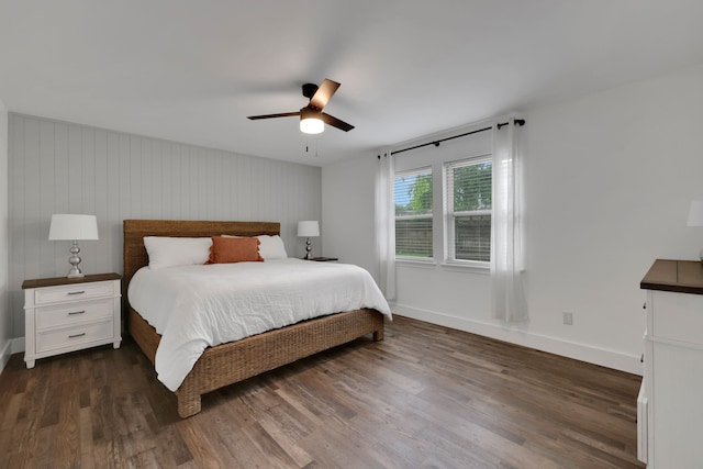 907 Eva Dr, Katy, TX 77493 - bedroom featuring dark wood-style flooring, baseboards, and a ceiling fan