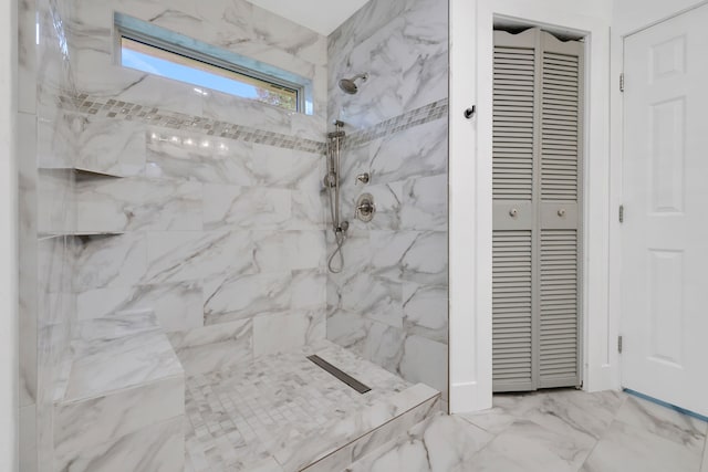 907 Eva Dr, Katy, TX 77493 - bathroom featuring a marble finish shower, a closet, and marble finish floors