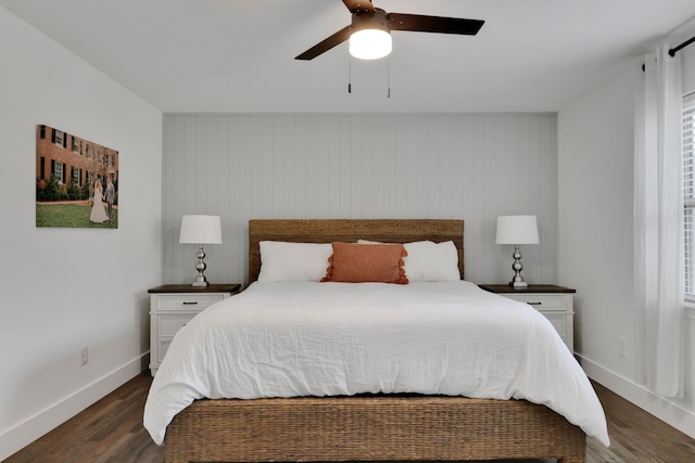 907 Eva Dr, Katy, TX 77493 - bedroom with dark wood-style flooring, baseboards, and a ceiling fan