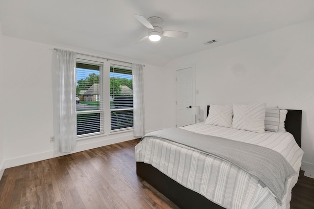 907 Eva Dr, Katy, TX 77493 - bedroom featuring wood finished floors, baseboards, and a ceiling fan