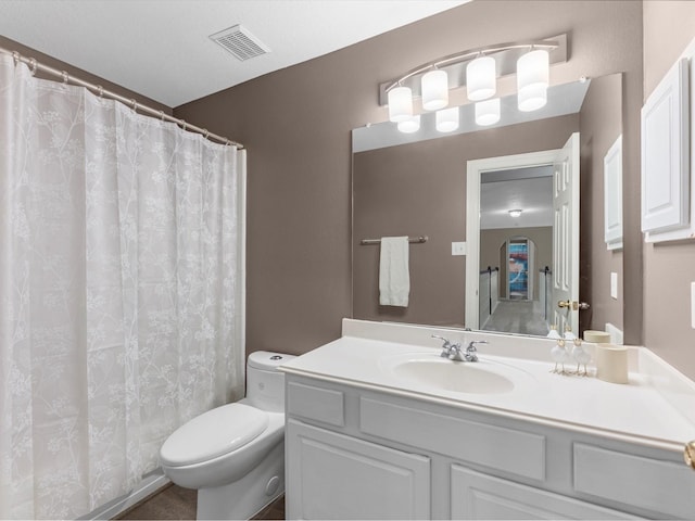 25169 Nutley Cir, Porter, TX 77365 - bathroom with toilet, vanity, and a shower with shower curtain