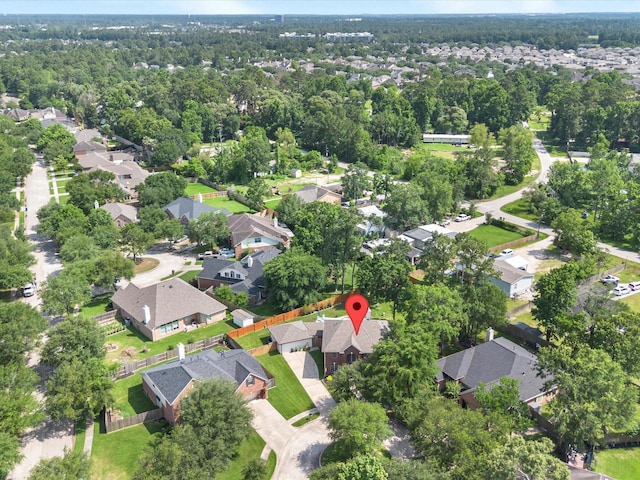 25169 Nutley Cir, Porter, TX 77365 - aerial view of property and surrounding area featuring nearby suburban area and a forest