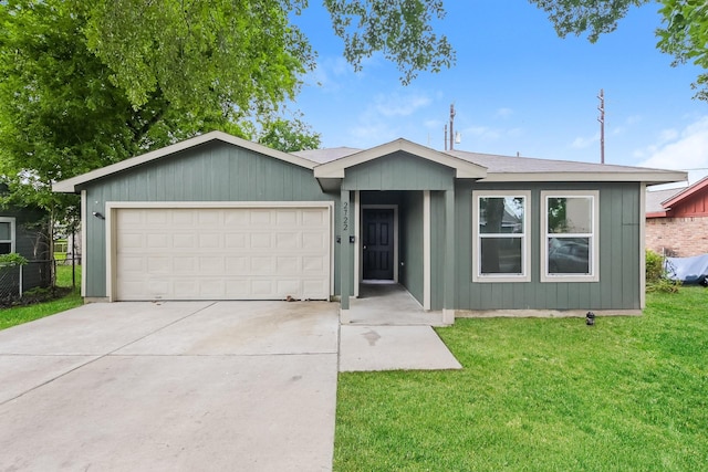 2722 Stallings Dr, Houston, TX 77088 - ranch-style house featuring an attached garage and concrete driveway