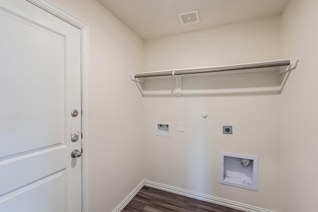2722 Stallings Dr, Houston, TX 77088 - laundry room with electric dryer hookup, washer hookup, dark wood-style flooring, baseboards, and gas dryer hookup