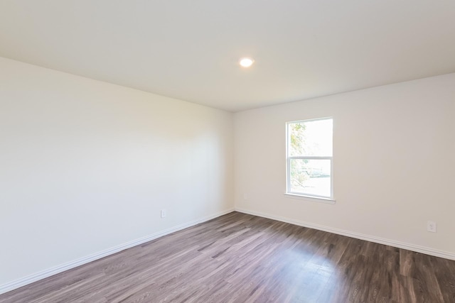 2722 Stallings Dr, Houston, TX 77088 - spare room with wood finished floors, baseboards, and recessed lighting