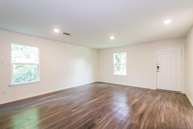 435 Connecticut St, Houston, TX 77029 - spare room with dark wood-style floors, baseboards, and recessed lighting