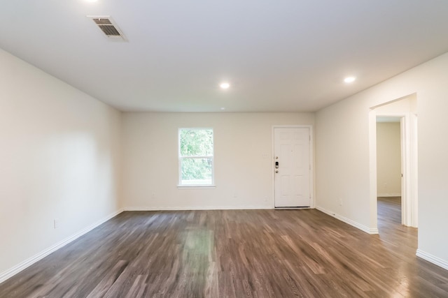 435 Connecticut St, Houston, TX 77029 - empty room featuring dark wood-style floors, baseboards, and recessed lighting