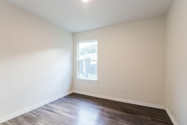 435 Connecticut St, Houston, TX 77029 - empty room with dark wood-style flooring and baseboards