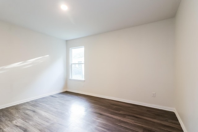 435 Connecticut St, Houston, TX 77029 - empty room featuring dark wood-style flooring and baseboards