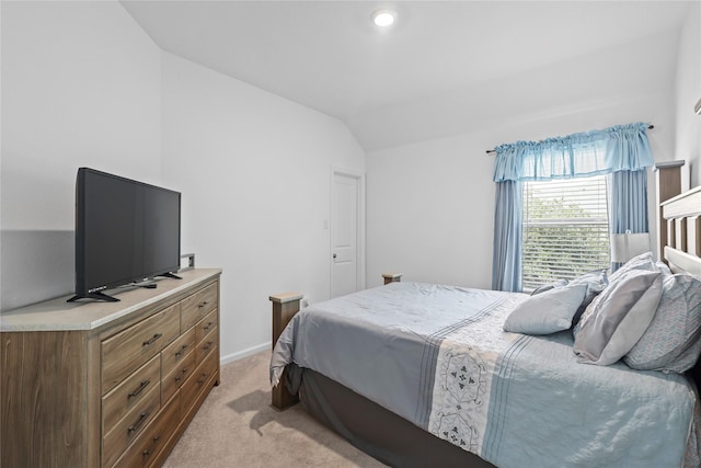 4050 Champlain Way, Rosharon, TX 77583 - bedroom with vaulted ceiling, light colored carpet, and baseboards