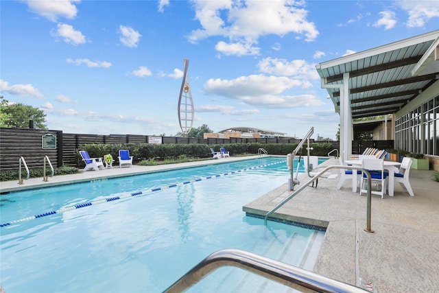 4050 Champlain Way, Rosharon, TX 77583 - community pool with a patio area