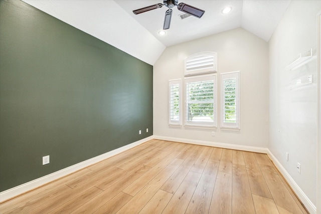 2215 Timbershade Ct, Magnolia, TX 77355 - unfurnished room with ceiling fan, baseboards, vaulted ceiling, light wood finished floors, and recessed lighting