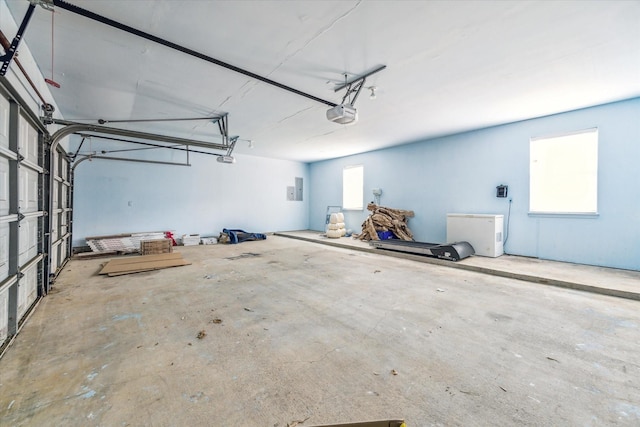 2215 Timbershade Ct, Magnolia, TX 77355 - garage with a garage door opener and electric panel