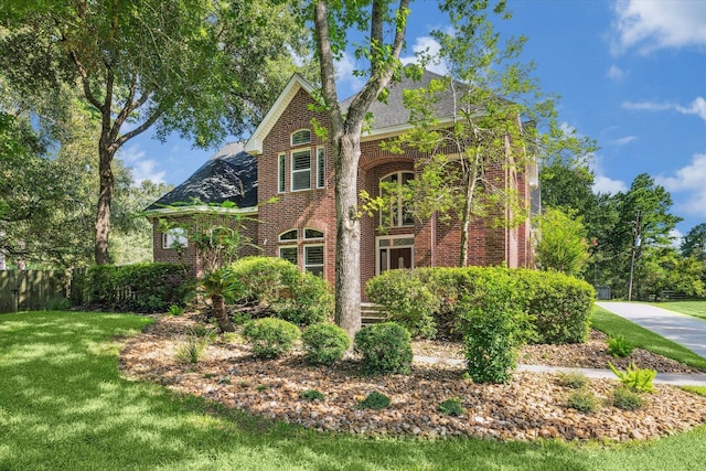 2215 Timbershade Ct, Magnolia, TX 77355 - tudor house with brick siding